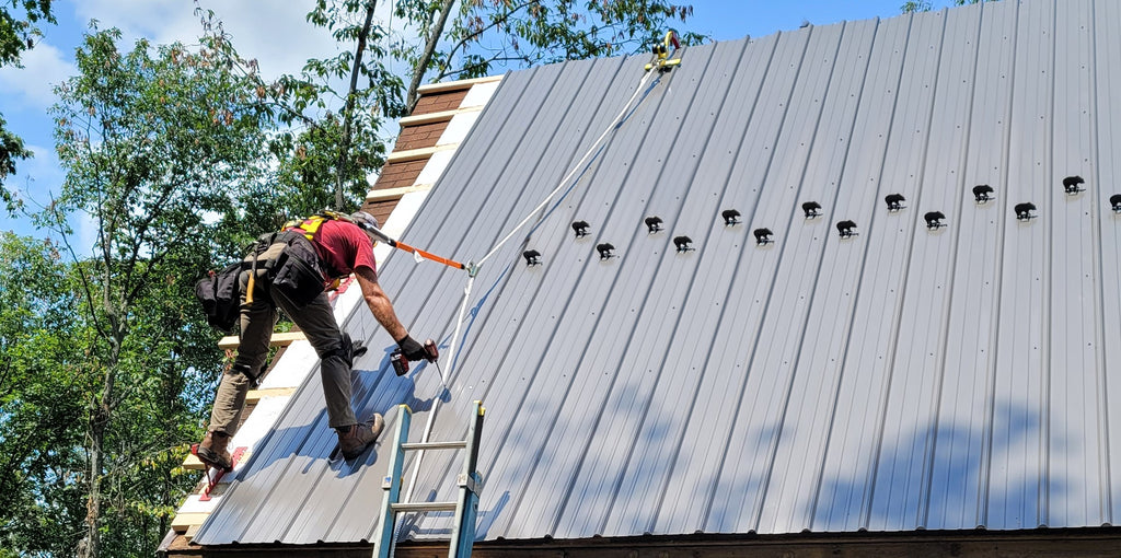 RIDGEPRO roof peak anchor installed at the roof ridge to provide a temporary tie-off point